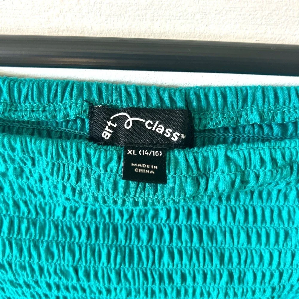 Teal girl’s fitted blouse